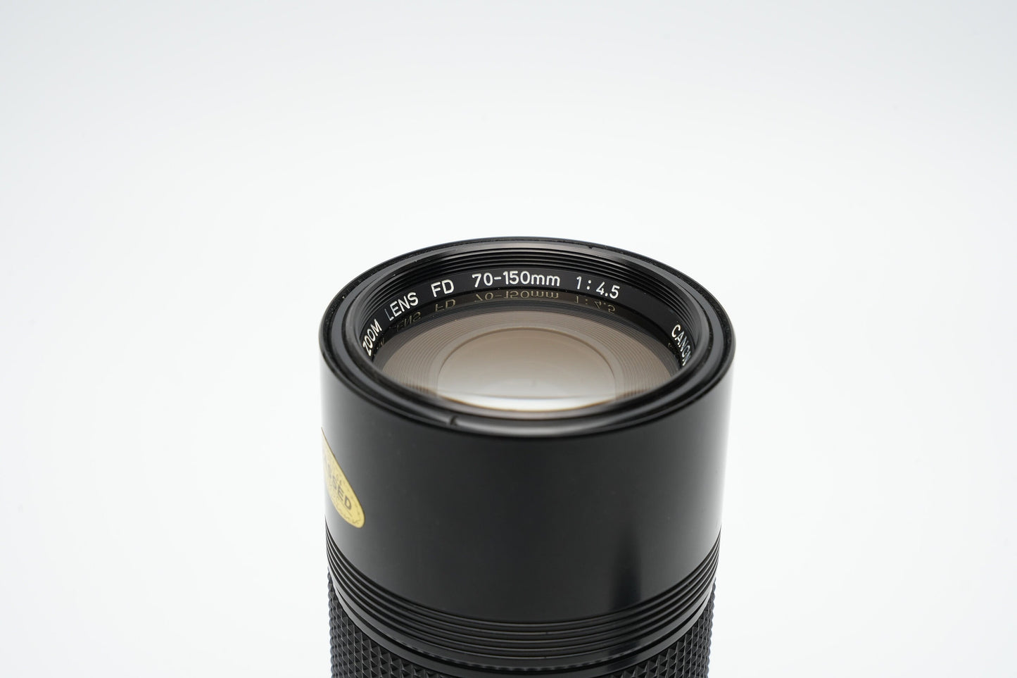 Canon FD 70-150 mm f4.5 zoomlens. Mooie scherpe optiek. Fantastisch bereik voor portretten met ingebouwde zonnekap