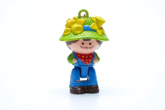 Vintage Charmkins Pop Corn – Zeldzame Hasbro Bedelfiguur uit 1983 – Jongen met Hoed en Bloemen