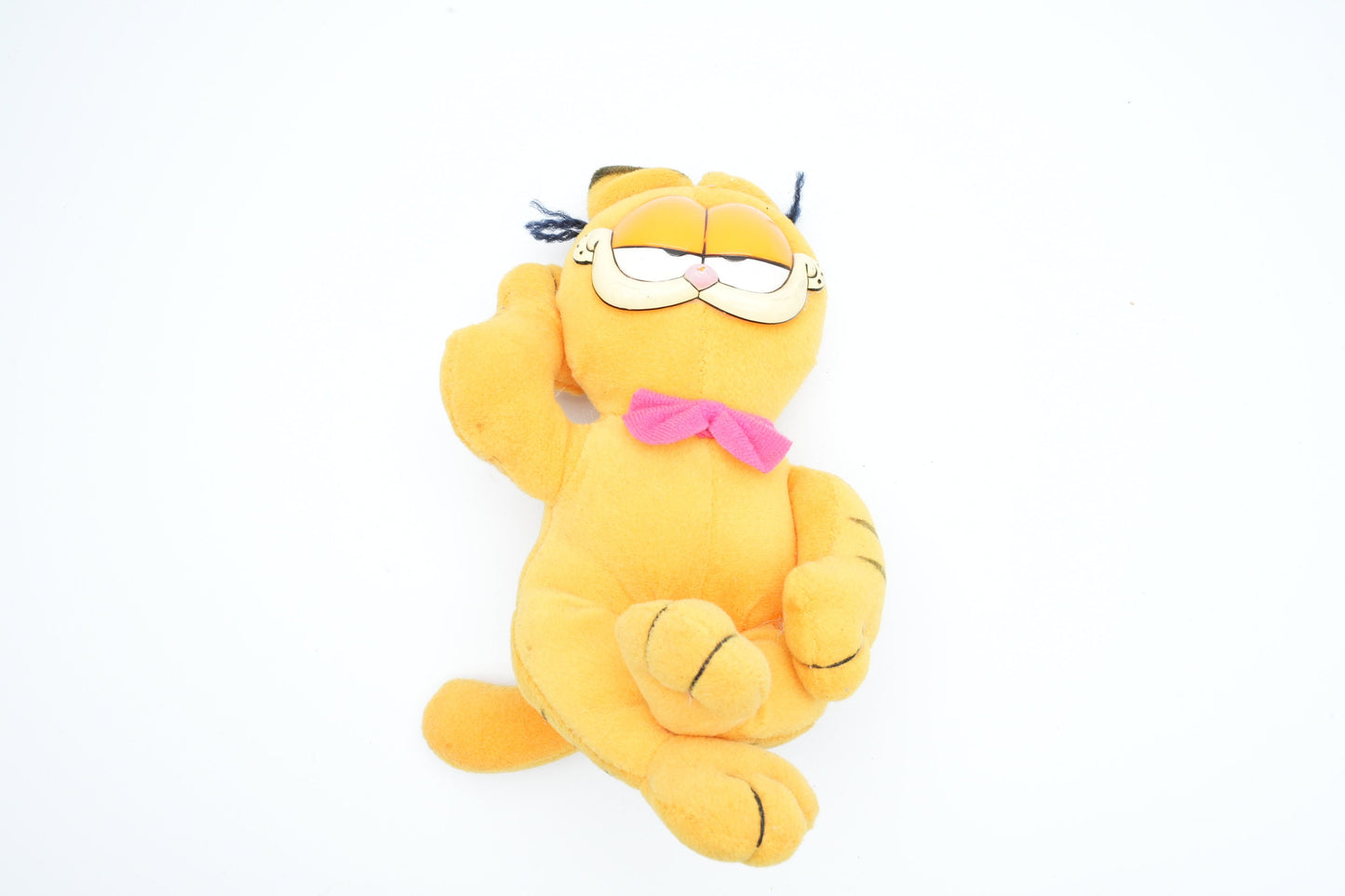 Vintage Garfield lying on the ground | vintage Garfield plush