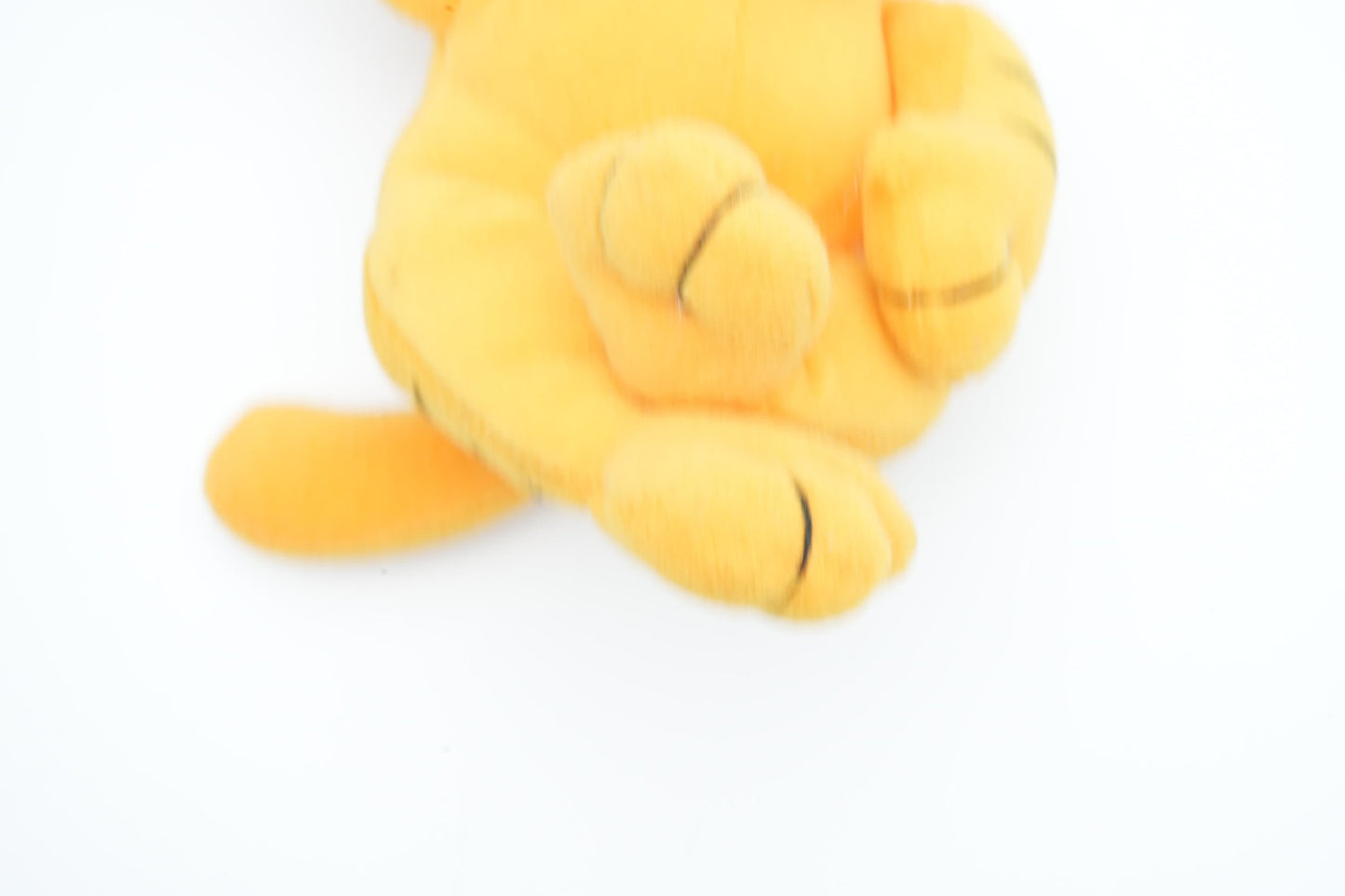 Vintage Garfield lying on the ground | vintage Garfield plush